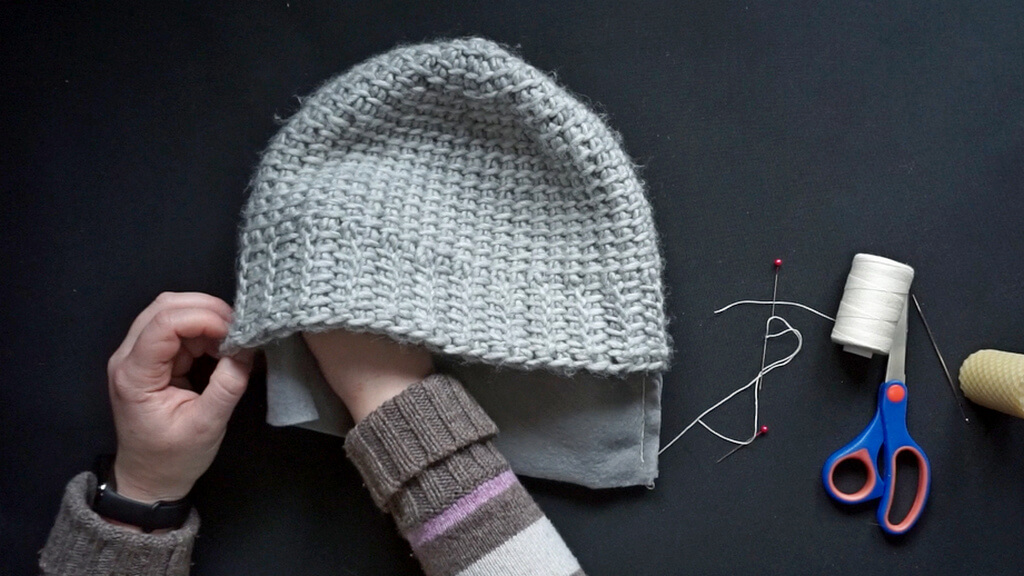 How to line a crochet beanie with fleece 11 How to line a crochet beanie. Inserting the lining in the hat.