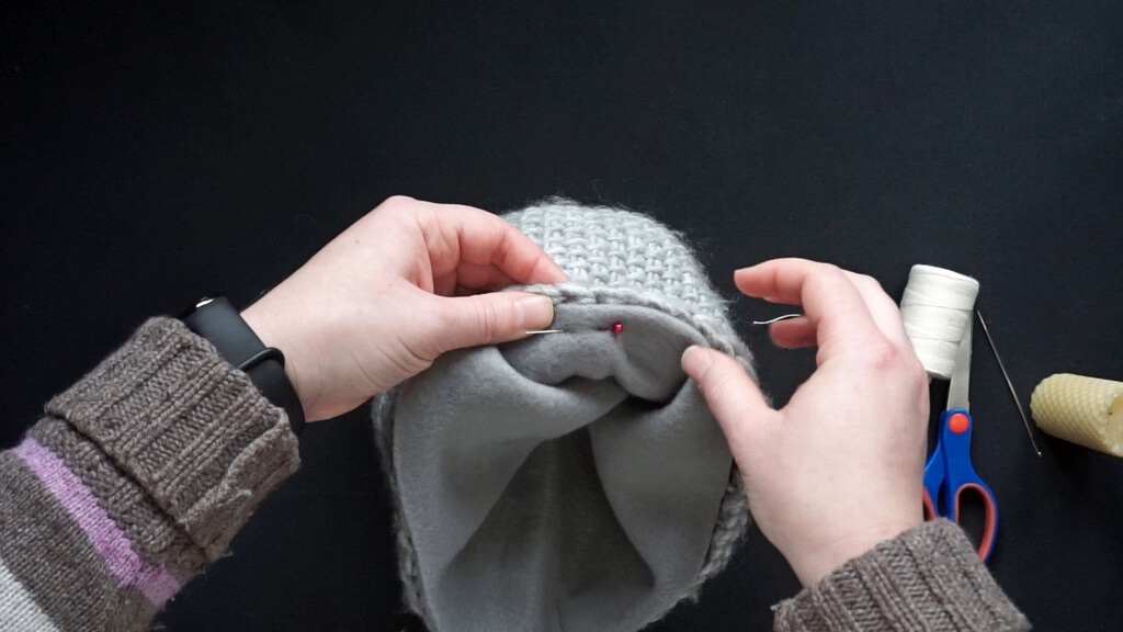 How to line a crochet beanie with fleece 18 Pinning the folded edge.