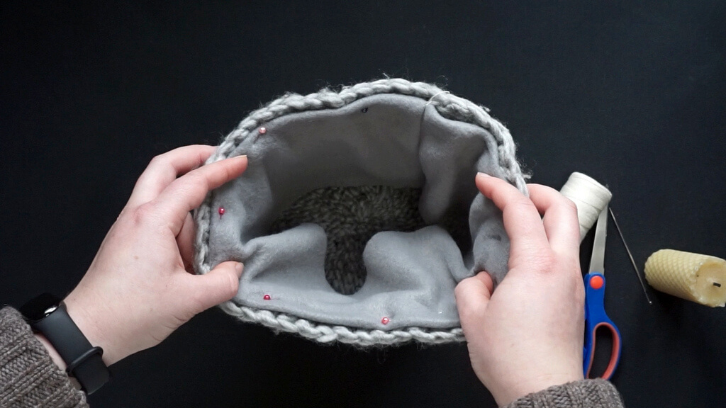 How to line a crochet beanie with fleece 19 20 Lining a beanie with fleece lining pinned next to the edge