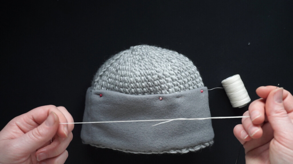 How to line a crochet beanie with fleece 26 27 Lining a beanie with fleece preparing the top edge 2