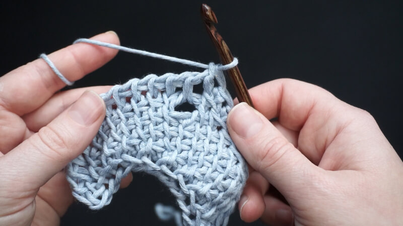 Tunisian crochet asymmetrical rounded triangle shawl tutorial 11 Tunisian Crochet kyanite shawl - the end of Row 11