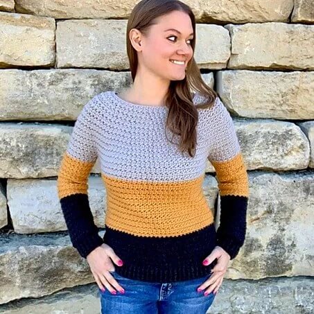 10+ Crochet round yoke sweaters and tops 8 A gray, yellow and black round yoke crochet sweater, with little clusters creating a textured appearance of the fabric