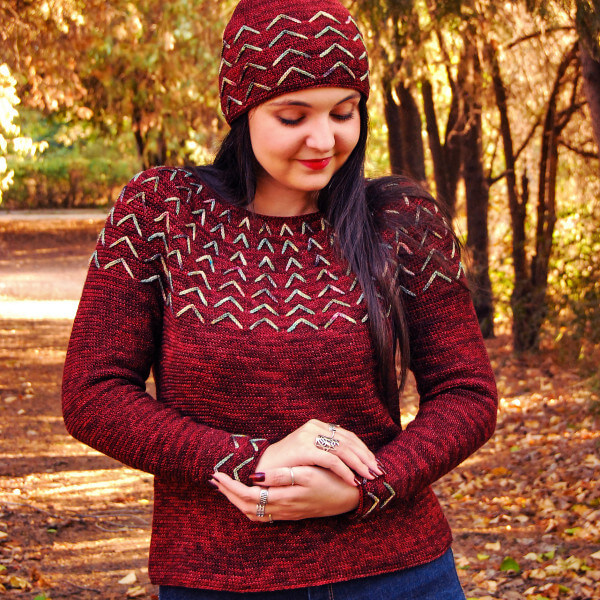 10+ Crochet round yoke sweaters and tops 9 Top down circular yoke sweater in hand-dyed variegated red yarn, with little arrows all around the yoke and at the sleeve ends.