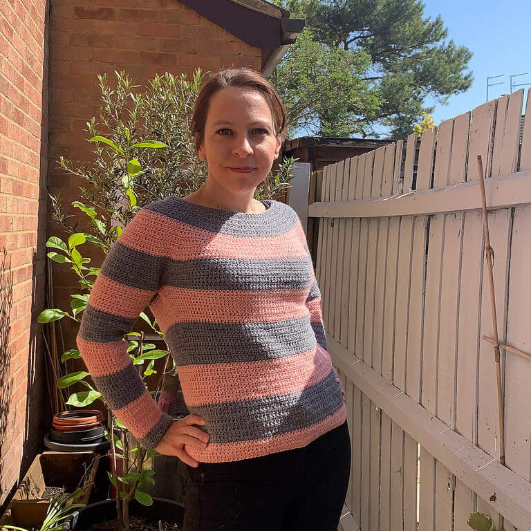 10+ Crochet round yoke sweaters and tops 7 Crochet sweater worked top down with a round yoke construction and wide bands in pink and gray.