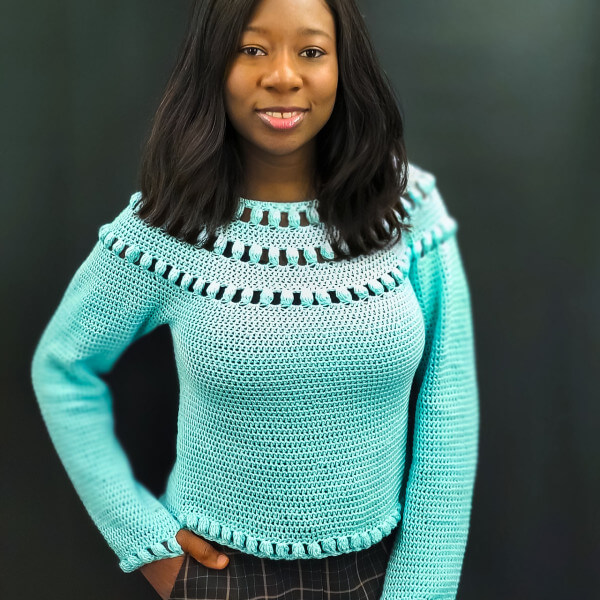10+ Crochet round yoke sweaters and tops 6 Round yoke sleeved top with parallel bands of lace and bobbles and matching lace at the body and sleeve edges.