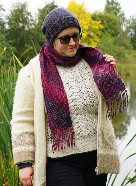 Corner to corner Tunisian crochet scarf pattern 3 Another way to wear a Tunisian crochet scarf, wrapped around the neck twice, with the ends shorter and resting on the body.