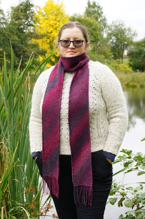 Corner to corner Tunisian crochet scarf pattern 2 One way to wear a Tunisian crochet scarf, wrapped around the neck once, with the ends trailing below.