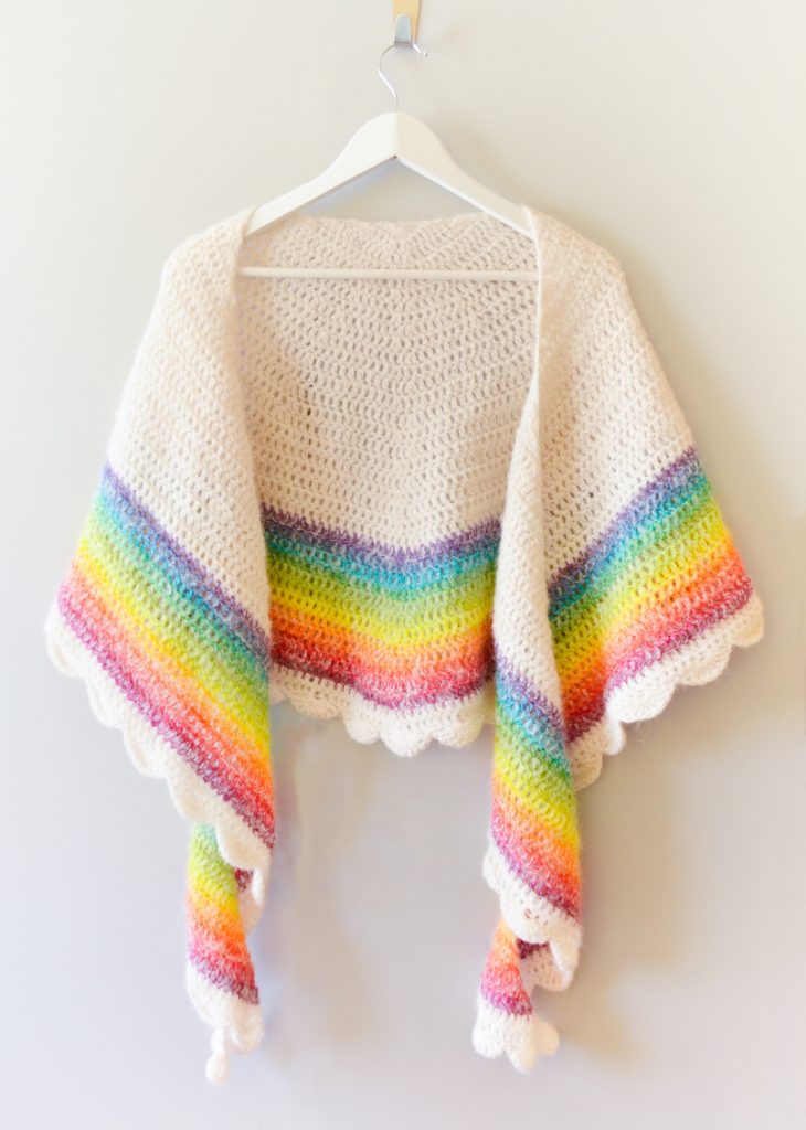 Rainbow shawl on a coat hanger