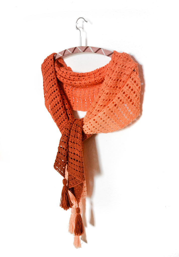 Imperial topaz wrap - easy Tunisian crochet pattern 1 Imperial topaz easy tunisian crochet lace pattern - sample on a hanger, side view