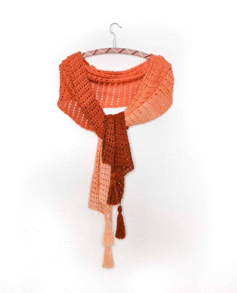 Imperial topaz wrap - easy Tunisian crochet pattern 2 Imperial topaz easy tunisian crochet lace pattern - sample on a hanger with a knot