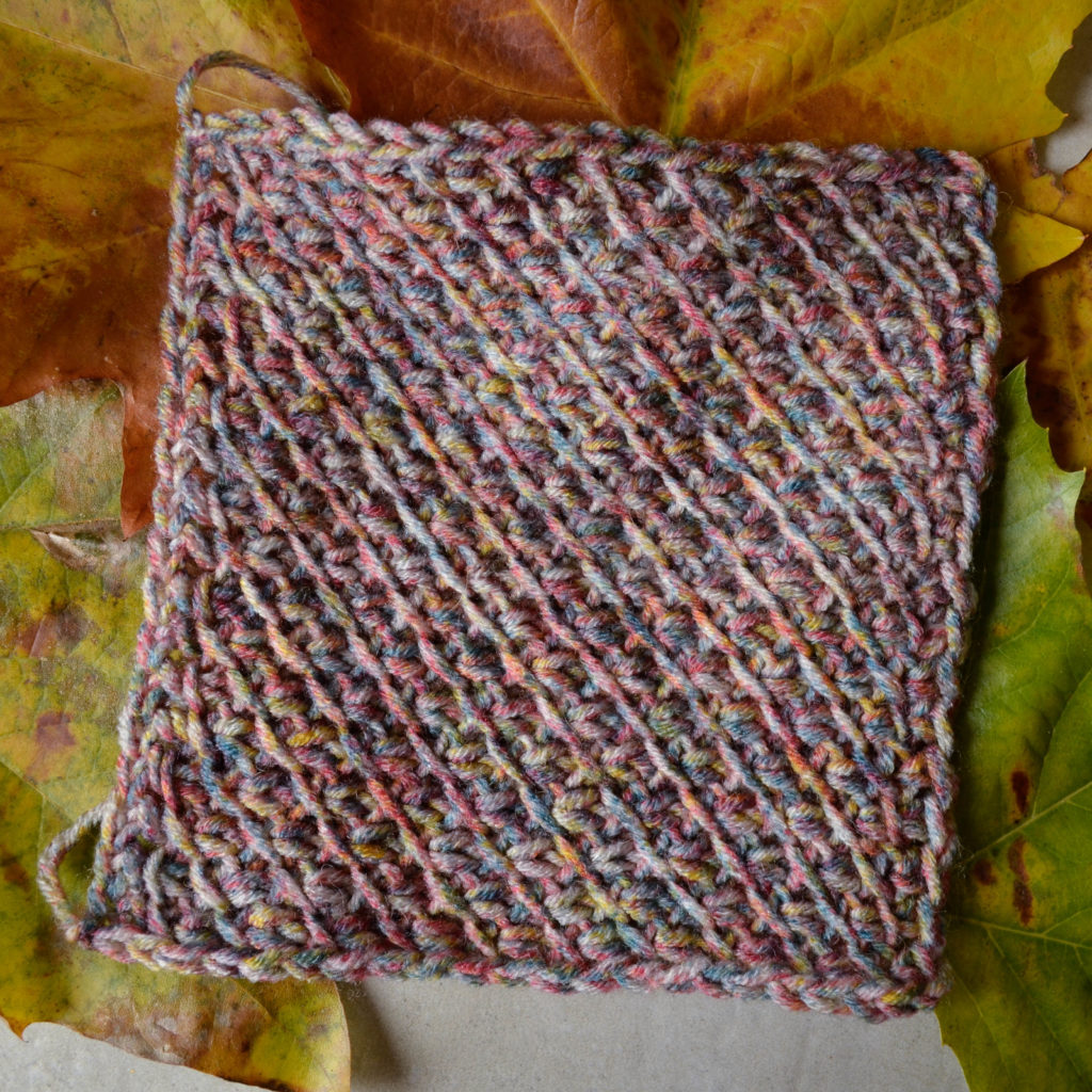 Tunisian crochet blanket square made with the X stitch