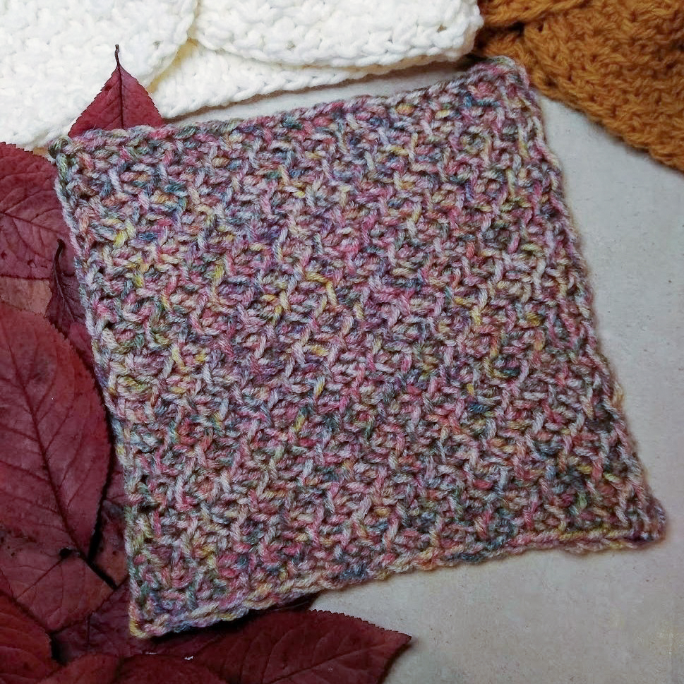 Tunisian crochet blanket square made with the honeycomb stitch