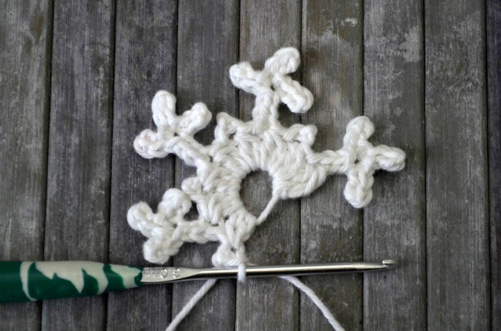 Easy snowflake crochet pattern yarnandy step 16