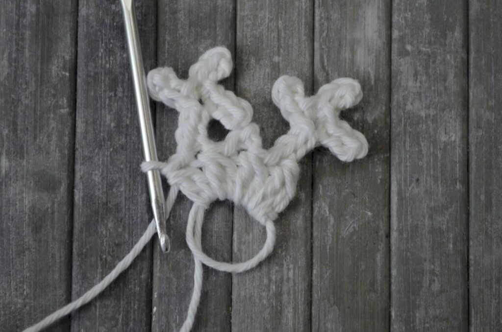Easy snowflake crochet pattern yarnandy step 12