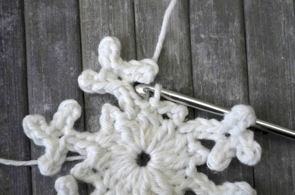Easy snowflake crochet pattern yarnandy step 19