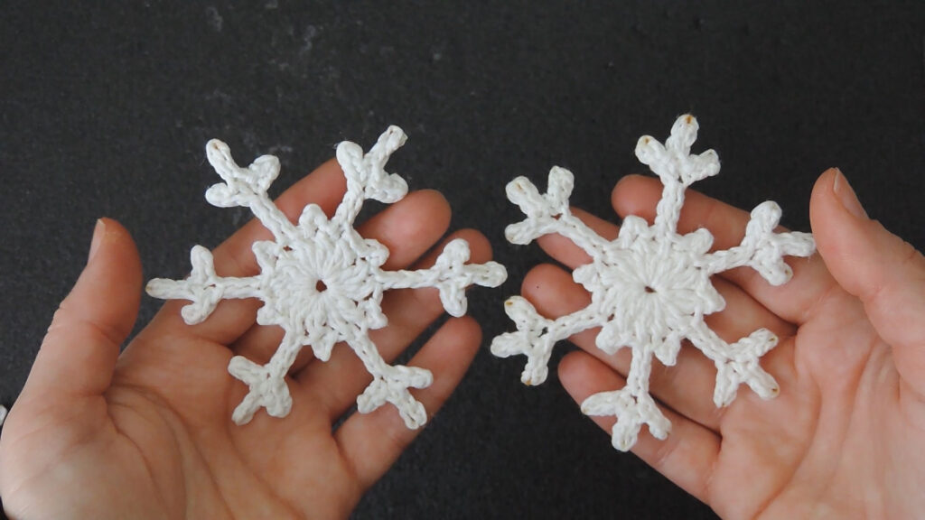 Two snowflakes - one starched, one stiffened with PVA glue