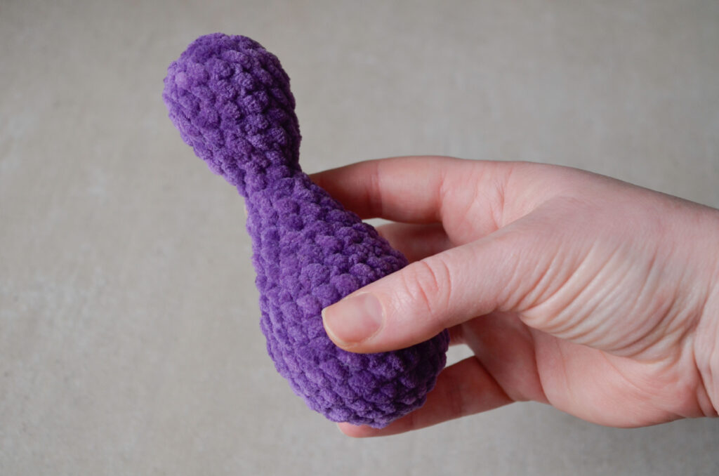 Small, purple version of the skittle crochet fidget toy