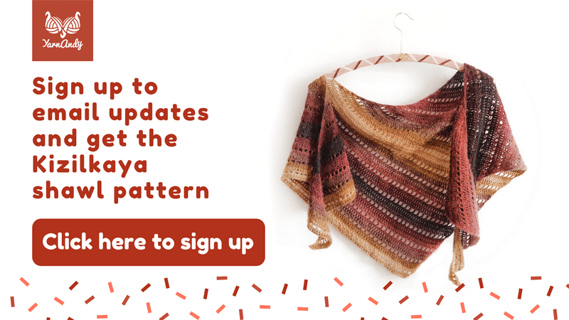 Sign up to Yarnandy email updates and get the Kizilkaya shawl pattern. Click here to sign up. Image of bias shawl with rows of eyelets, draped on a vintage coat hanger.