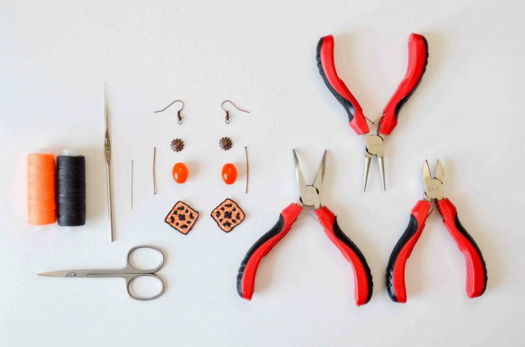 Spooky crochet earrings tools and materials