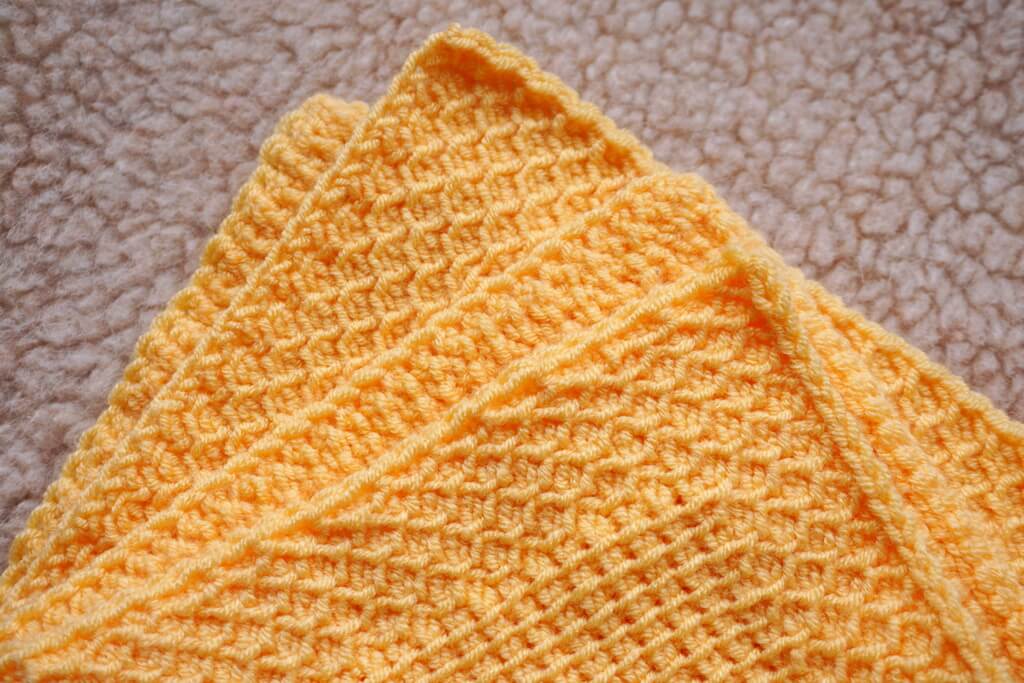 Tunisian crochet baby blanket pattern close-up of corners