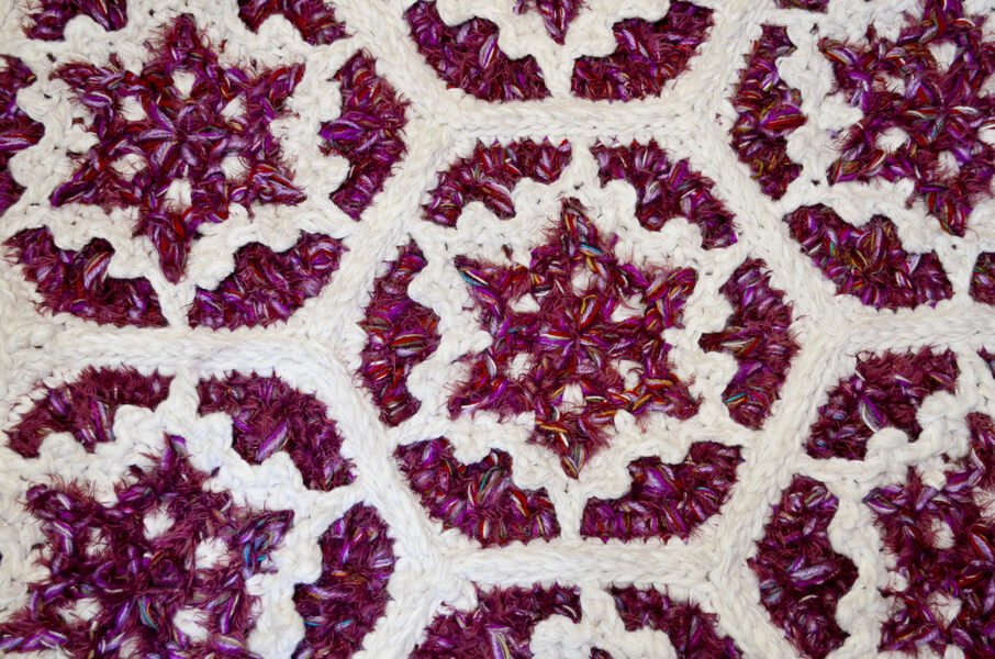 Snowflake rug from unwanted yarns