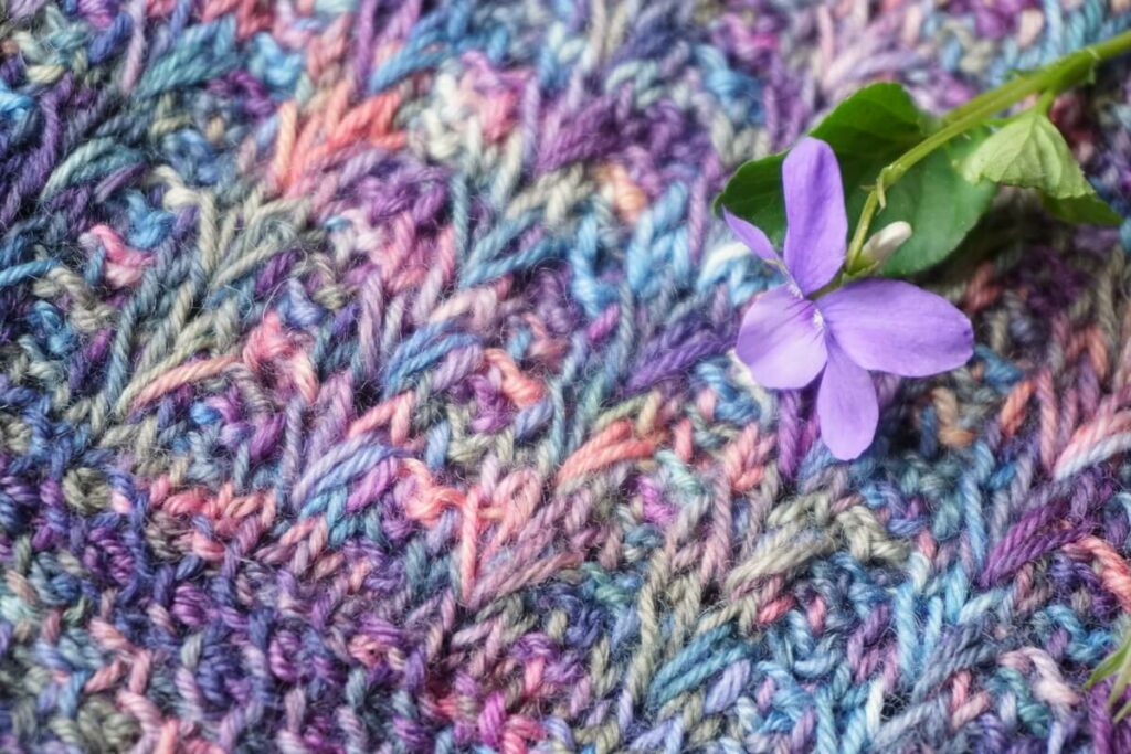 wild violets tunisian crochet cowl close up with flower
