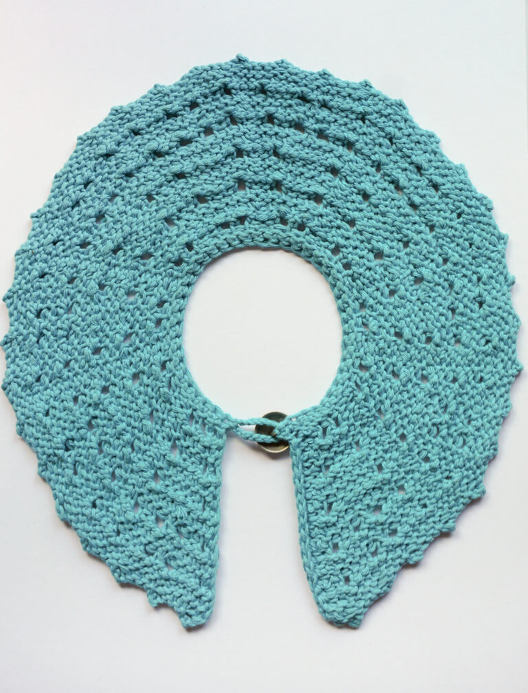 Back view of the Tunisian crochet lace collar, showing the eyelets and the backs of the Tunisian reverse stitches