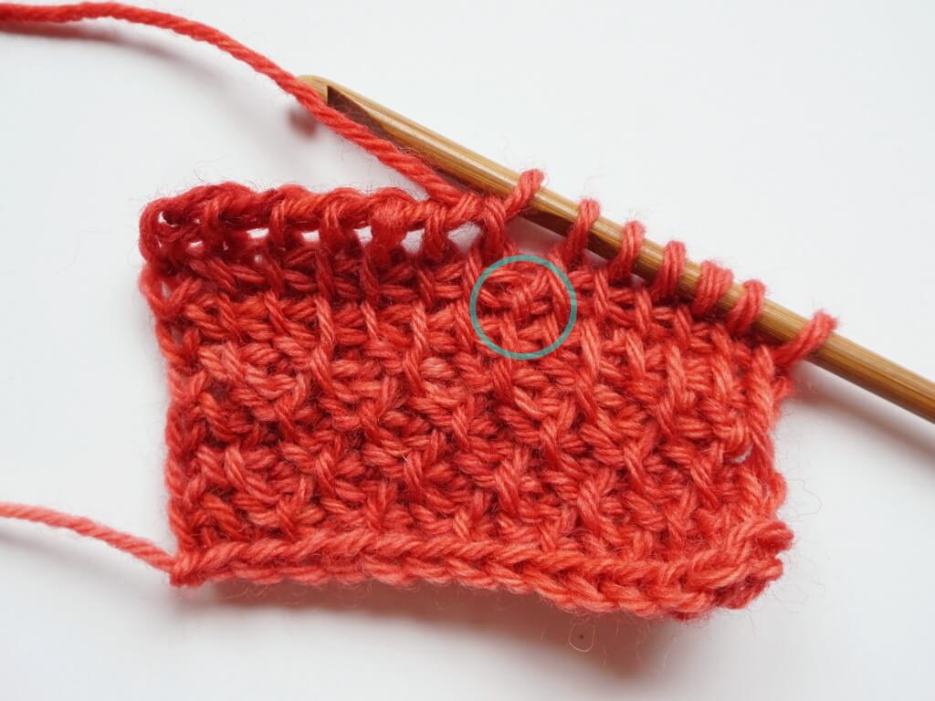 Fixing a skipped stitch in Tunisian crochet step 1