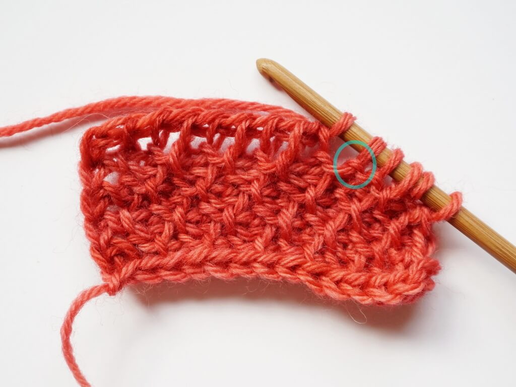 Fixing a wrong stitch in Tunisian crochet return pass step 1