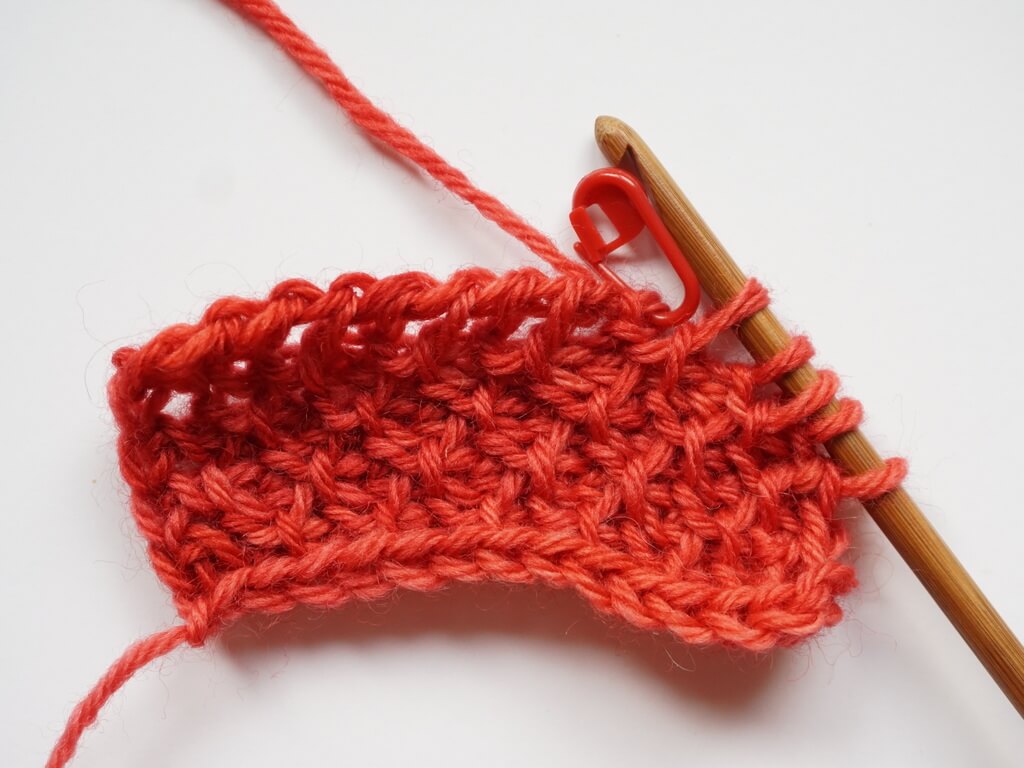 Fixing a wrong stitch in Tunisian crochet return pass step 4