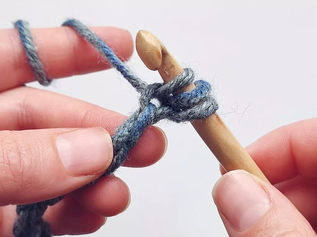 Tunisian crochet eyelets in a foundation row tutorial - picking up a loop in the first chain