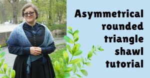 Photo of person wearing a Tunisian crochet asymmetrical rounded triangle shawl in light blue to dark blue gradient with text "asymmetrical rounded triangle shawl tutorial"