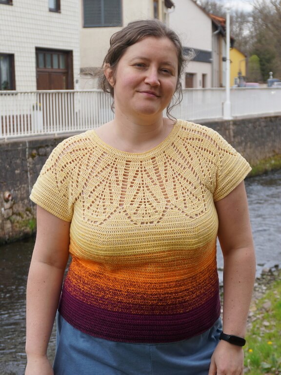 Lifting the back neckline of crochet round yokes 1 Front view of yellow to dark purple gradient summer top with feathery lace round yoke and plain body, with bust shaping for a perfect fit.